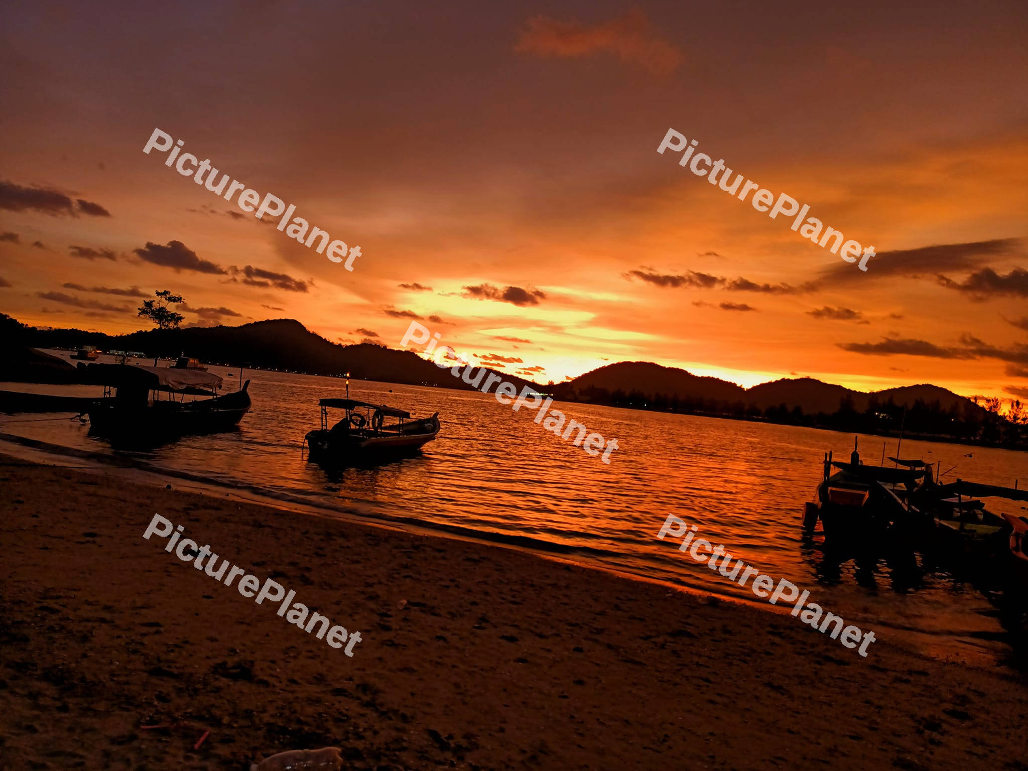 Wooden boats at Sunset